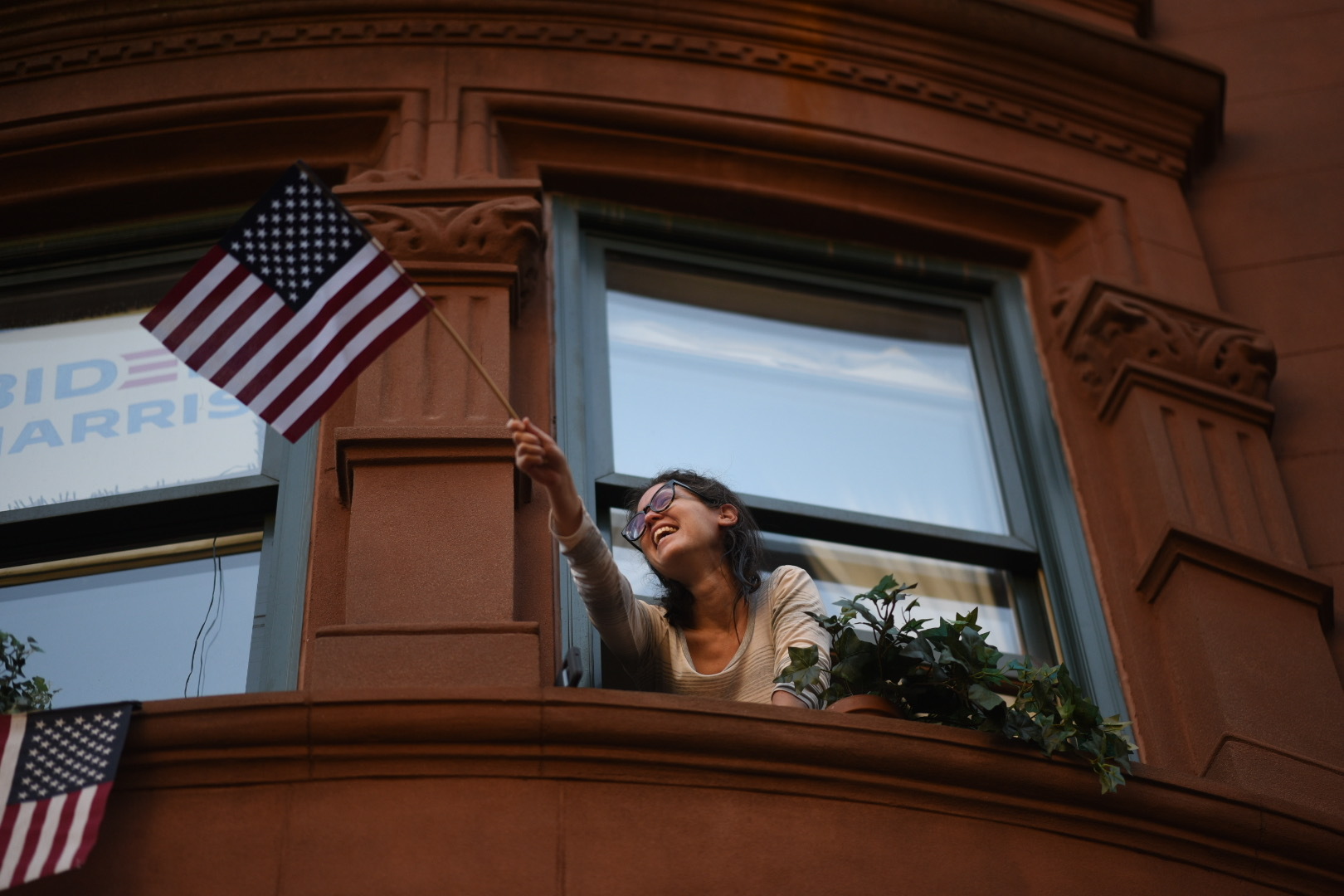 Photos of people celebrating Biden defeating Trump